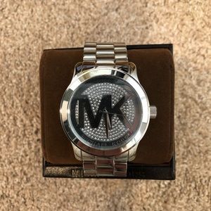 Michael Kors Watch, Silver in color.